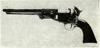 Twelve cylinder stops and Navv-type loading lever latch distinguish this later Rigdon & Ansley revolver from earlier production, but trigger guard roots reveal same milling cut as first pistols. Finish was originally casehardened, frame and lever, with blued barrel and cylinder. Handle straps are brass.