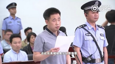 Xie Yang reading his final statement during his trial