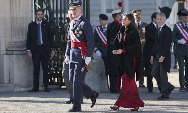 Queen Letizia is wearing a red embroidered long dress by Felipe Varela, at Pascua Militar ceremony as a tradition