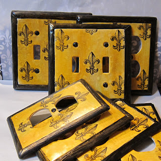 These are custom fleur-de-lis light switch plate covers by Marie Young Creative
