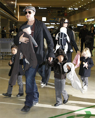 brad pitt and angelina jolie family photos. Brad Pitt is repped by Kevin