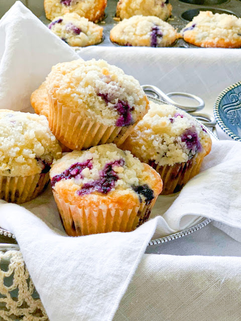 These blueberry muffins are made with simple, straightforward ingredients and bursting with fresh blueberries.  To taste even better, they are topped with a sweet streusel topping.