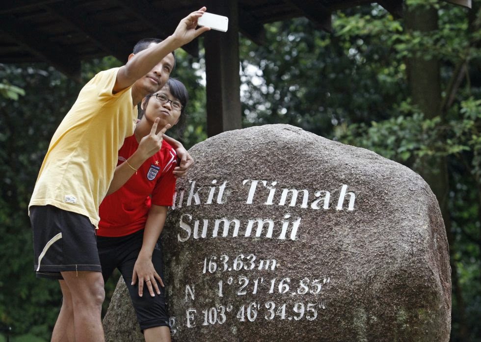 Visitors at Bukit Timah Nature Reserve summit on June 21, 2014