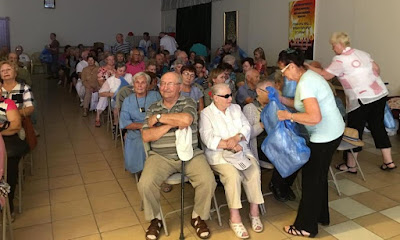 Holocaust Survivors and pensioners watch fall Jewish Holiday presentation in Israel