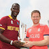 Darren Sammy and Eoin Morgan With the World Cup T20 Trophy