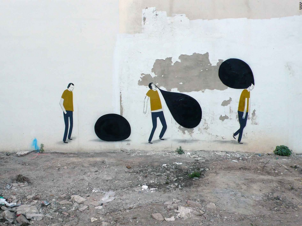 20 strong street art works that reveal the truth of life