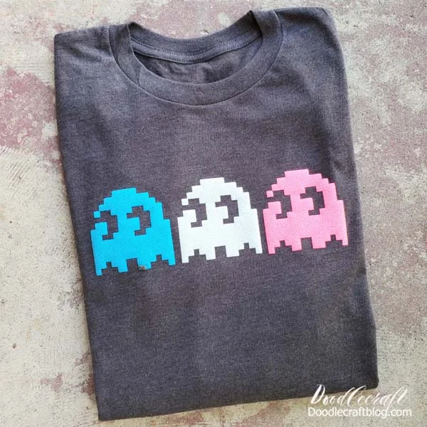 Pac-Man Ghosts Shirt with Glow in Dark Puff Vinyl!  Pac-Man ghosts shirt!? Yesss!!!   Does it get better than that? Yesss!!!   Glow-in-the-dark...and Puff Heat Transfer Vinyl!   Learn how to make the perfect Pac-Man Ghost shirt, for comic conventions, the geek in your life or just for a fun shirt to wear during the Autumn time.   This shirt checks all the boxes.