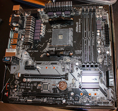 Photo of a motherboard before anything is plugged into it