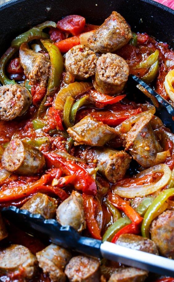 Flavorful chunks of Italian sausage are combined with diced tomatoes, garlic, oregano, basil, lots of red and green bell pepper and onion for an easy weeknight meal.