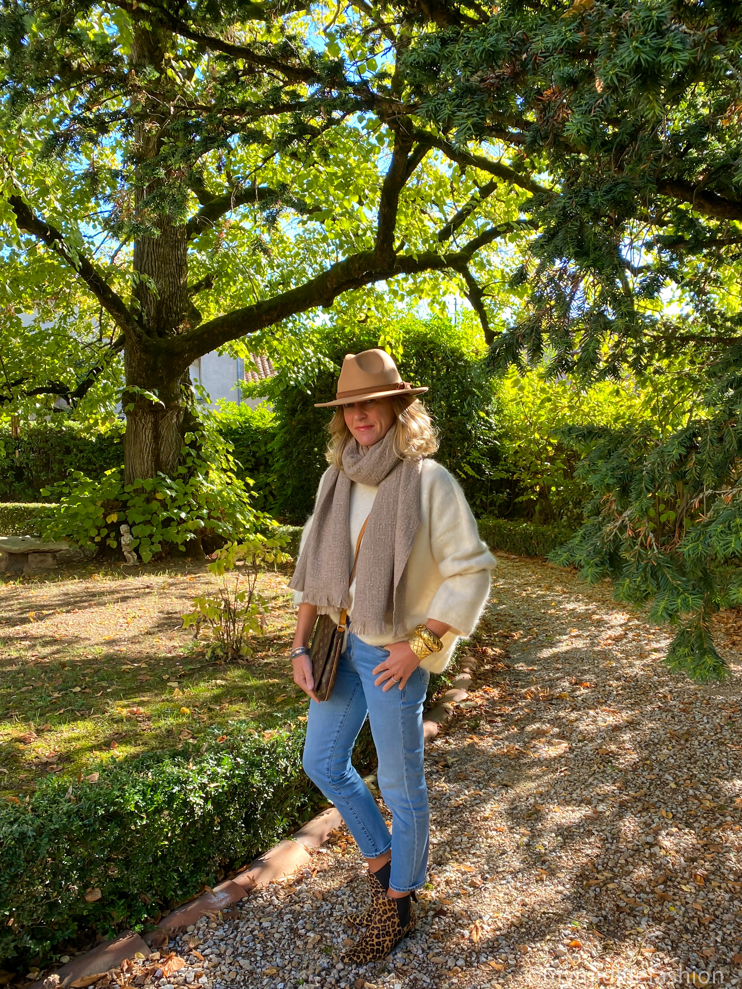 my midlife fashion, black basket weave cashmere shawl, Louis Vuitton crossbody bag, amazon fedora hat, baukjent boyfriend jean, hush leopard print kitten heel boots