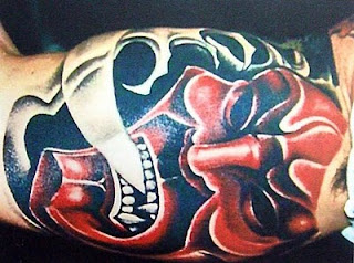 Design Mask Devil Tattoo In Arm