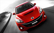 Behind the 2010 Mazdaspeed3's smiling face is Mazda's familiar 2.3L .