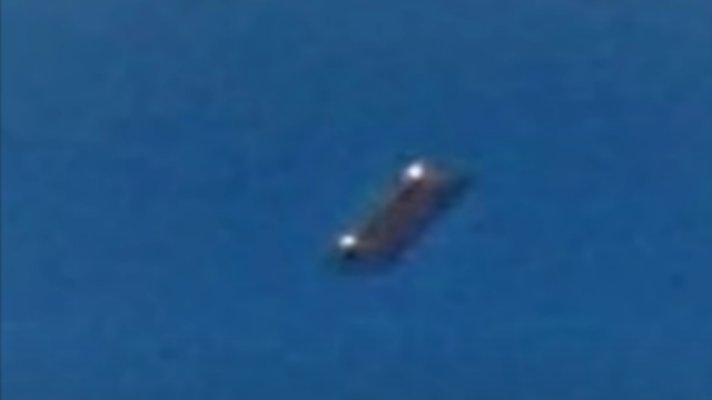 This is the silver and rectangular shaped shiny UFO that was photographed over Maui in Hawaii, US.