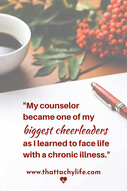 POTS syndrome blog quote saying, "My counselor became one of my biggest cheerleaders as I learned to face life with a chronic illness." In the background are a blank sheet of paper, a red pen, a cup of coffee, and red berries with greenery arranged on a tabletop.