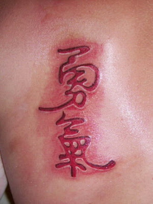 ink tattoo. Red ink tattoo