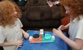 two boys playing Toilet Trouble Flushdown  you don't really get wet