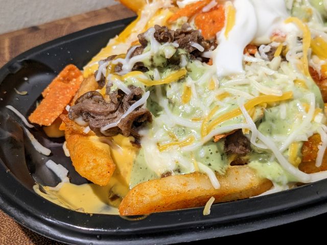 Taco Bell Steak Chile Verde Nacho Fries close-up.