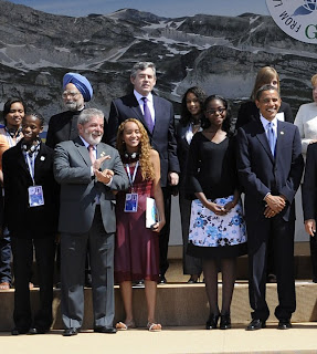 G8 delegate includingLuiz Inacio Lula da Silva, Mayora Tavares and   Barack Obama gather for a group picture at the G8 Summit in L'Aquila July 9, 2009