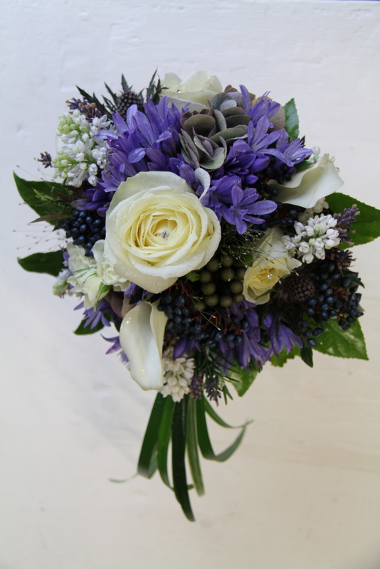 Spring Wedding Bouquet in Blue Agapanthus Lilac Blue Thistles 