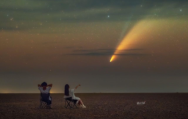 A couple watching Neowise in a open area