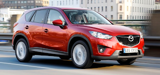 2013 Mazda CX-5 red driving