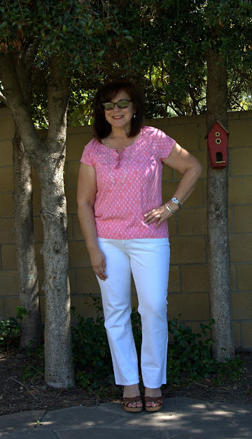 white jeans and pink top