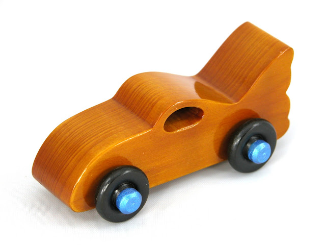 Handmade Wood Toy Car based on the Bat Car in the Play Pal Series, Amber Body, Metallic Blue Hubs, Black Wheels