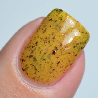 yellow nail polish with flakies