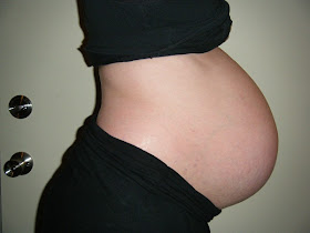 Full Term Bare Pregnant Belly