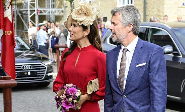 Crown Princess Mary wore a red Armonia silk georgette dress by Raquel Diniz. Crown Prince Frederik