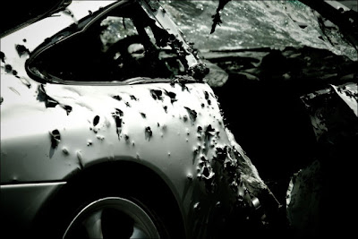 Porsche 911 Gets Shot up with Ammunition Seen On lolpicturegallery.blogspot.com