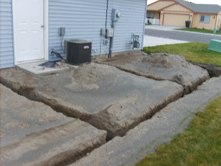 Sprinkler trenches on the west side of the house