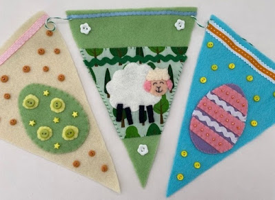 Homemade felt Easter bunting with eggs and sheep