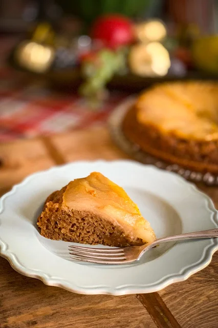 Warm gingerbread cake baked in a skillet on top of a sweet mixture of caramelized pears and flipped over to a stunning presentation, fancy enough for a Thanksgiving dessert.