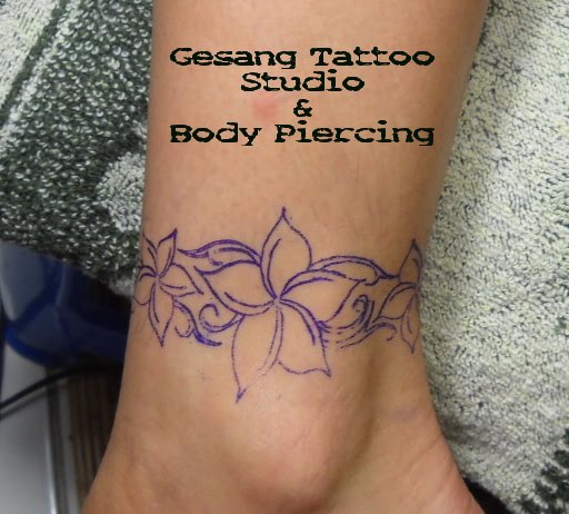 frangipani tattoo designs on foot