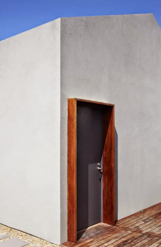 Little Gray Sunken House Minimalist Design with Small Room in Underground