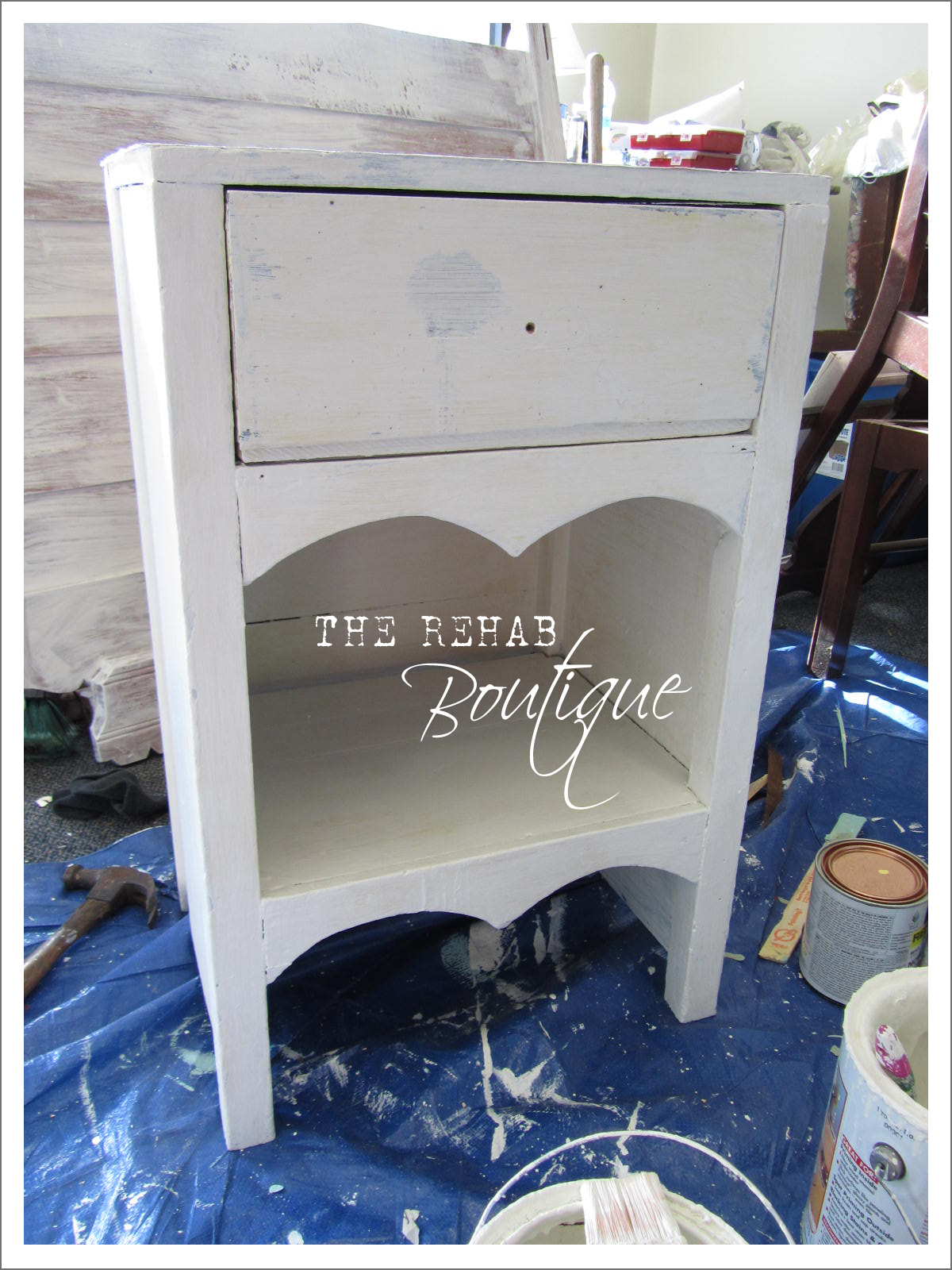 ... the top and drawer were in rough shape, I covered them with Anaglypta