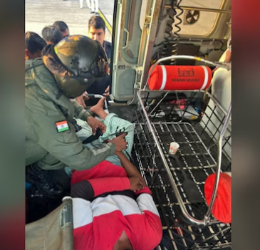  Off the coast of Kerala, the Indian Coast Guard saves a fisherman from a sinking fishing boat