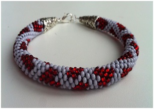  http://www.diyjewelrymaking.com/12-strands-beaded-kumihimo-pattern-hearts-by-elena-komina/