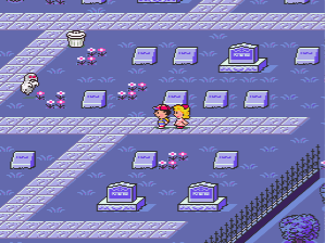 Ness and Paula explore the graveyards of Threed in EarthBound.