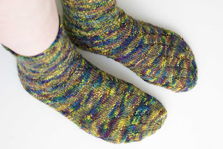 picture of 'Helter Skelter' heel-less tube socks knitted in DT Craft and Design pure wool DK in shade 'Iris'