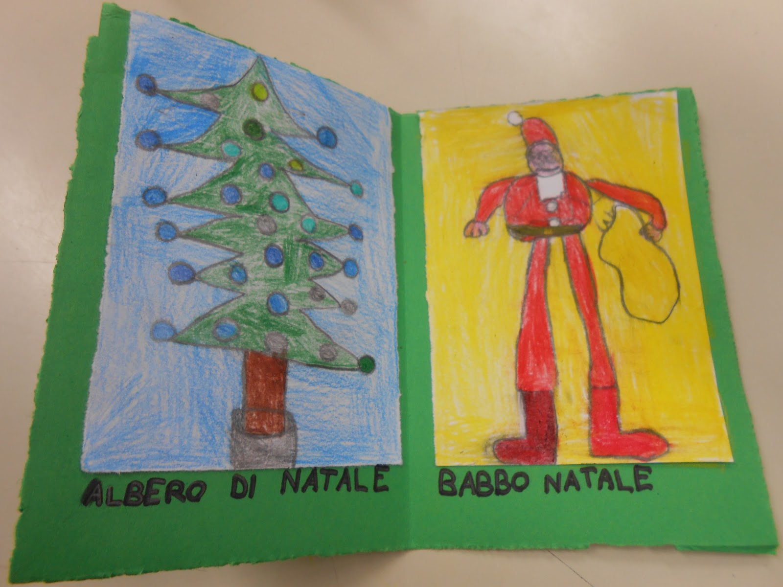 Hanno colorato l abete con i colori freddi grigi blu verde e Babbo Natale con i colori caldi rosso arrancione giallo