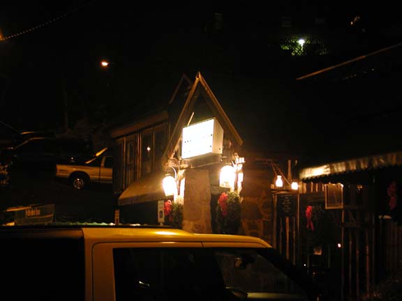 Dark night with glowing restaurant in Knoxville