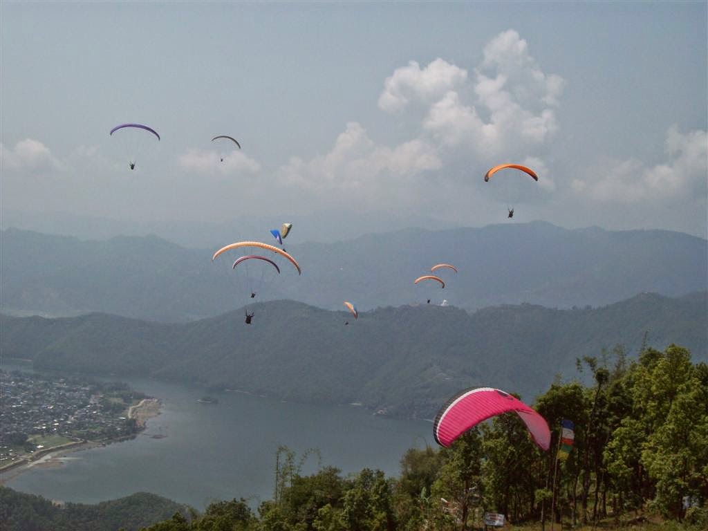 http://www.nepaltraveldoor.com/paragliding-in-nepal.php