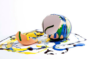Cracked Egg Shell With Splattered Paint Everywhere