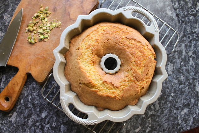 Food Lust People Love: Orange almond cake batter is spooned onto sweet roasted rhubarb and baked to golden perfection for a beautiful dessert your whole family will adore. Drizzled with the sticky rhubarb syrup and topped with chopped pistachios for a hit of color and crunch, this roasted rhubarb upside down cake is our new favorite sweet treat.