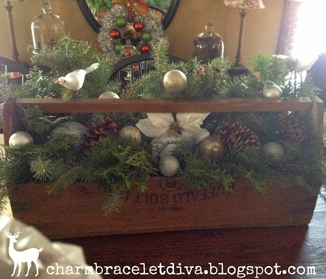 vintage wooden tool box ornaments evergreens Christmas centerpiece