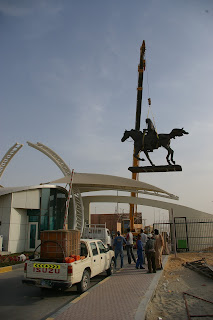 The bronze horse takes flight.