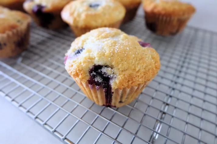 baked blueberry muffin on cooling rack