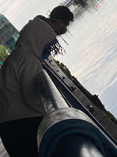 Coworkers peering off Fort Point